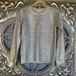 Festive silver knit sweater.